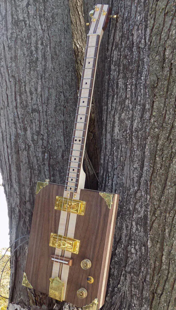 Learn how to play cigar box guitar Kalymi Music Blogs