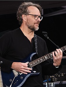 Photo of Brent Robitaille Playing Guitar